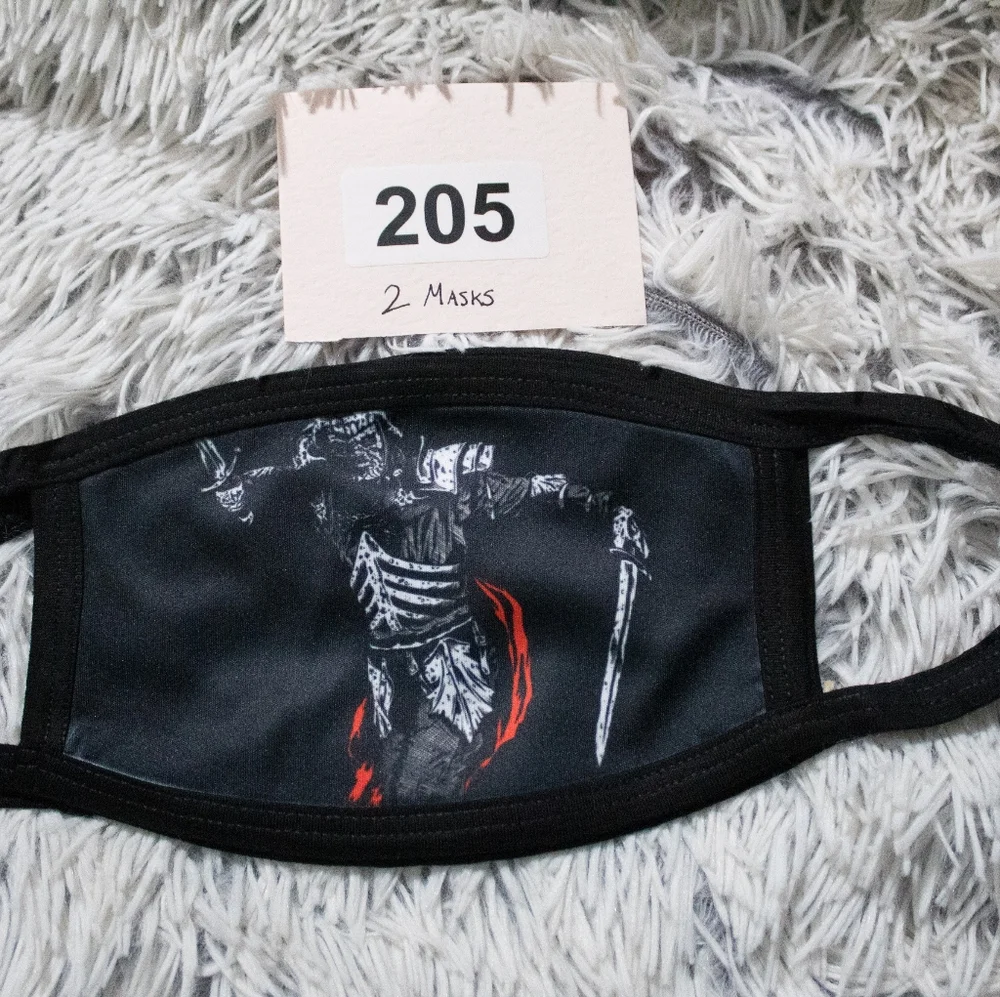 Black cloth face mask featuring a medieval warrior graphic